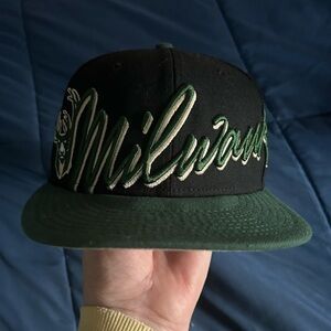 Milwaukee Bucks fitted flat Bill hat. 7 1/4 inches.